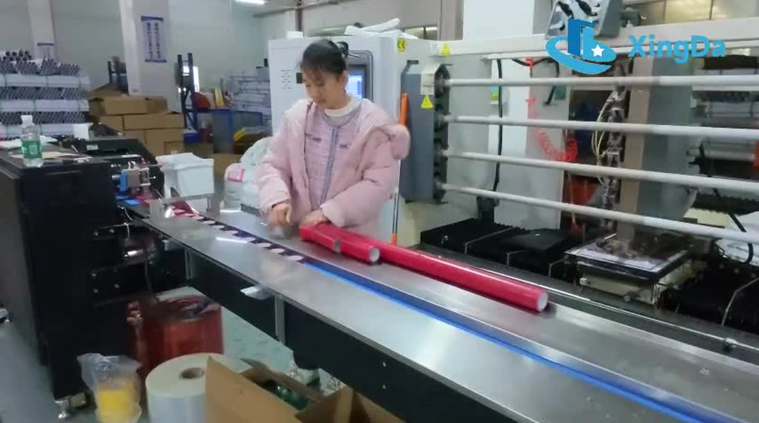 Xingda staff preparing finished adhesive tape rolls